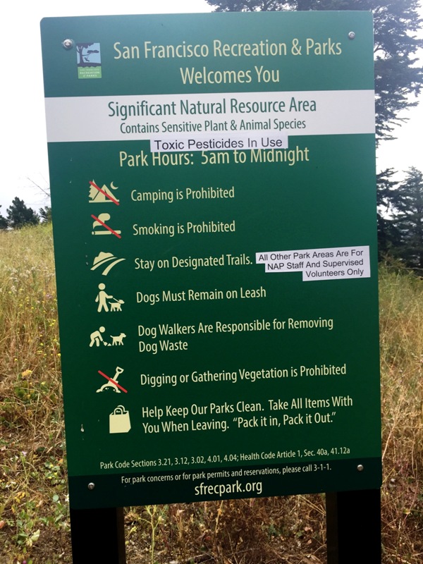 This sign in a "natural area" has been altered to express the public's opinion of the Natural Areas Program. Courtesy San Francisco Forest Alliance.